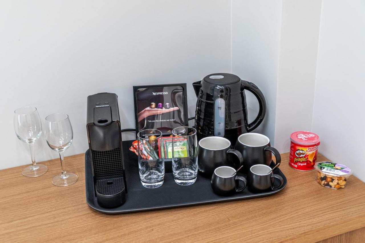 Hellenic Vibes Smart Hotel 아테네 외부 사진 A Nespresso coffee machine in a hotel room